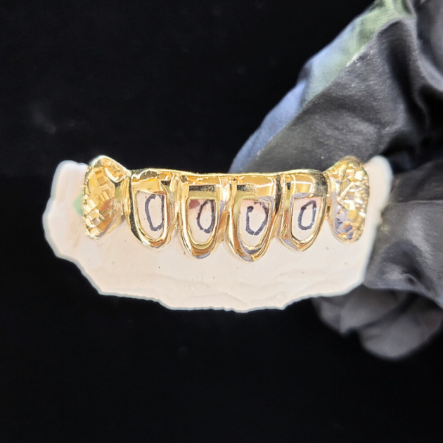 Open with Canine Diamond Cut. Grillzpage.com